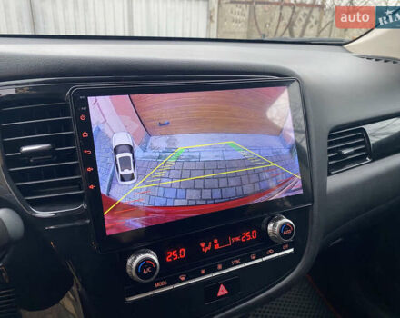 Красный Мицубиси Аутлендер, объемом двигателя 2 л и пробегом 40 тыс. км за 23500 $, фото 23 на Automoto.ua