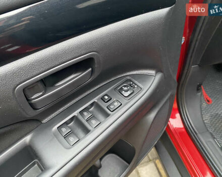 Красный Мицубиси Аутлендер, объемом двигателя 2 л и пробегом 40 тыс. км за 23500 $, фото 19 на Automoto.ua