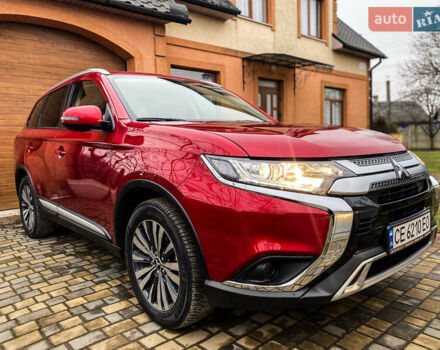 Красный Мицубиси Аутлендер, объемом двигателя 2 л и пробегом 40 тыс. км за 23500 $, фото 38 на Automoto.ua