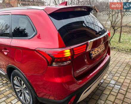 Красный Мицубиси Аутлендер, объемом двигателя 2 л и пробегом 40 тыс. км за 23500 $, фото 41 на Automoto.ua