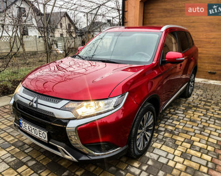 Красный Мицубиси Аутлендер, объемом двигателя 2 л и пробегом 40 тыс. км за 23500 $, фото 33 на Automoto.ua