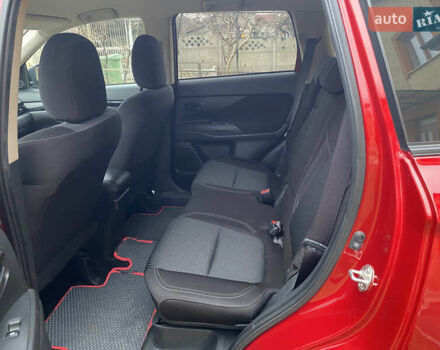 Красный Мицубиси Аутлендер, объемом двигателя 2 л и пробегом 40 тыс. км за 23500 $, фото 25 на Automoto.ua