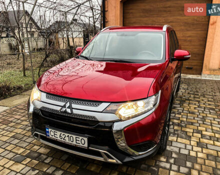 Красный Мицубиси Аутлендер, объемом двигателя 2 л и пробегом 40 тыс. км за 23500 $, фото 35 на Automoto.ua