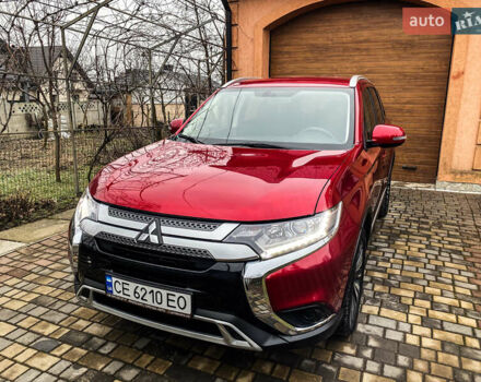 Красный Мицубиси Аутлендер, объемом двигателя 2 л и пробегом 40 тыс. км за 23500 $, фото 4 на Automoto.ua