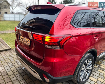 Красный Мицубиси Аутлендер, объемом двигателя 2 л и пробегом 40 тыс. км за 23500 $, фото 40 на Automoto.ua
