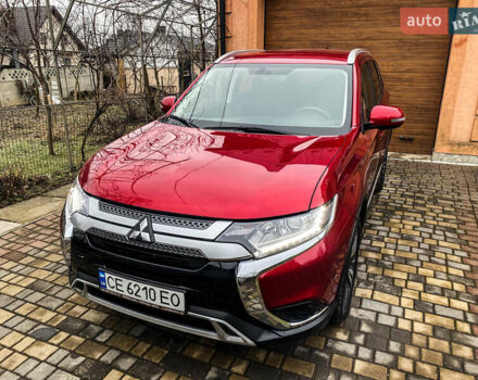 Красный Мицубиси Аутлендер, объемом двигателя 2 л и пробегом 40 тыс. км за 23500 $, фото 3 на Automoto.ua