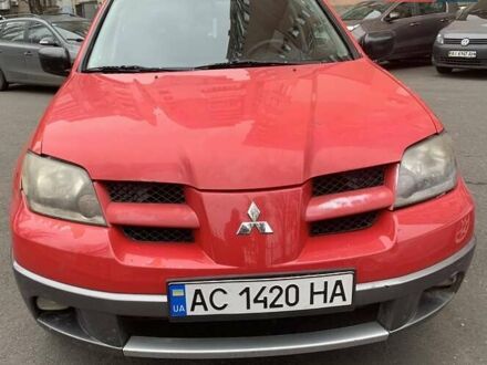 Червоний Міцубісі Аутлендер, об'ємом двигуна 2 л та пробігом 340 тис. км за 4300 $, фото 1 на Automoto.ua
