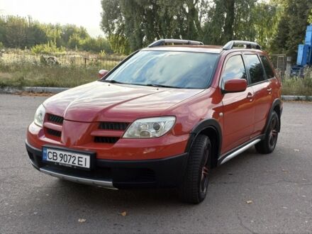 Мицубиси Аутлендер 2006 в Чернигове на Automoto.ua Красный Мицубиси Аутлендер, объемом двигателя 2.4 л и пробегом 220 тыс. км за 7500 $, фото 1 на Automoto.ua