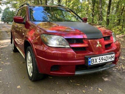 Мицубиси Аутлендер 2007 в Гайсине на Automoto.ua Красный Мицубиси Аутлендер, объемом двигателя 2.4 л и пробегом 187 тыс. км за 5700 $, фото 1 на Automoto.ua