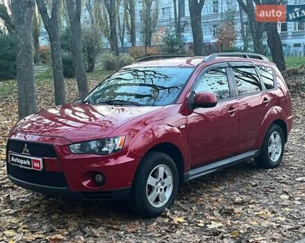 Червоний Міцубісі Аутлендер, об'ємом двигуна 2.4 л та пробігом 251 тис. км за 8990 $, фото 1 на Automoto.ua