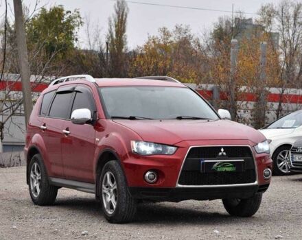 Червоний Міцубісі Аутлендер, об'ємом двигуна 2.4 л та пробігом 204 тис. км за 9499 $, фото 1 на Automoto.ua