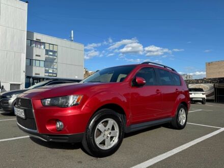 Красный Мицубиси Аутлендер, объемом двигателя 2 л и пробегом 269 тыс. км за 8700 $, фото 1 на Automoto.ua