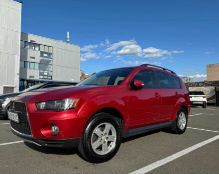 Красный Мицубиси Аутлендер, объемом двигателя 2 л и пробегом 269 тыс. км за 8700 $, фото 1 на Automoto.ua