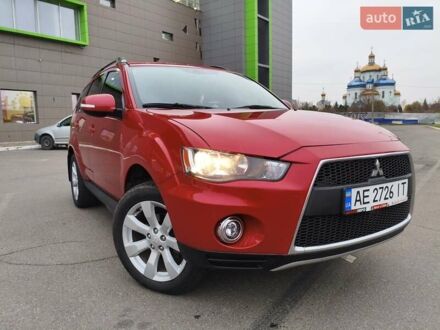 Красный Мицубиси Аутлендер, объемом двигателя 2.36 л и пробегом 93 тыс. км за 11499 $, фото 1 на Automoto.ua