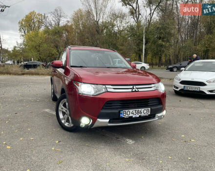 Красный Мицубиси Аутлендер, объемом двигателя 2.36 л и пробегом 149 тыс. км за 12500 $, фото 1 на Automoto.ua