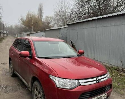 Красный Мицубиси Аутлендер, объемом двигателя 2 л и пробегом 96 тыс. км за 15500 $, фото 1 на Automoto.ua