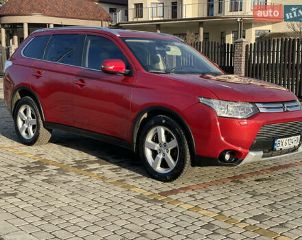 Красный Мицубиси Аутлендер, объемом двигателя 3 л и пробегом 230 тыс. км за 13900 $, фото 1 на Automoto.ua