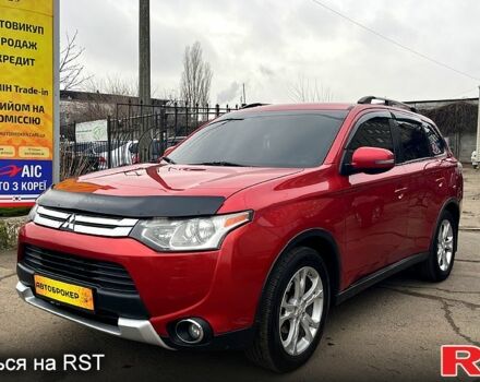 Красный Мицубиси Аутлендер, объемом двигателя 2.4 л и пробегом 209 тыс. км за 13500 $, фото 1 на Automoto.ua