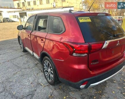 Красный Мицубиси Аутлендер, объемом двигателя 2.36 л и пробегом 180 тыс. км за 5000 $, фото 1 на Automoto.ua