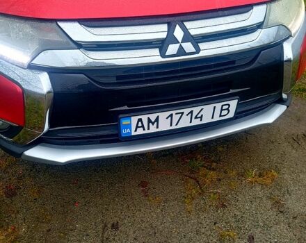 Червоний Міцубісі Аутлендер, об'ємом двигуна 2.4 л та пробігом 131 тис. км за 16300 $, фото 1 на Automoto.ua