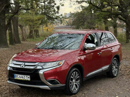Червоний Міцубісі Аутлендер, об'ємом двигуна 2.36 л та пробігом 190 тис. км за 12000 $, фото 1 на Automoto.ua
