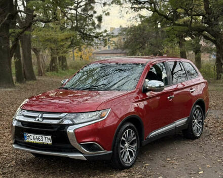 Червоний Міцубісі Аутлендер, об'ємом двигуна 2.36 л та пробігом 190 тис. км за 12000 $, фото 1 на Automoto.ua
