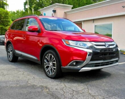 Червоний Міцубісі Аутлендер, об'ємом двигуна 2.4 л та пробігом 71 тис. км за 10800 $, фото 1 на Automoto.ua