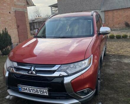 Червоний Міцубісі Аутлендер, об'ємом двигуна 2.4 л та пробігом 188 тис. км за 16000 $, фото 1 на Automoto.ua