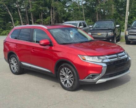 Червоний Міцубісі Аутлендер, об'ємом двигуна 2.4 л та пробігом 51 тис. км за 8900 $, фото 1 на Automoto.ua