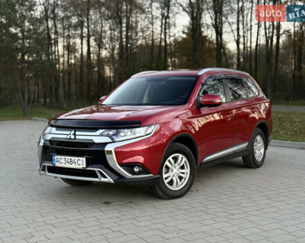 Красный Мицубиси Аутлендер, объемом двигателя 2 л и пробегом 85 тыс. км за 18900 $, фото 1 на Automoto.ua