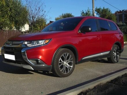 Червоний Міцубісі Аутлендер, об'ємом двигуна 2.4 л та пробігом 117 тис. км за 10500 $, фото 1 на Automoto.ua