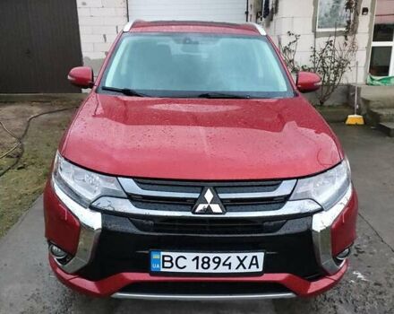 Червоний Міцубісі Аутлендер, об'ємом двигуна 2 л та пробігом 113 тис. км за 20500 $, фото 1 на Automoto.ua