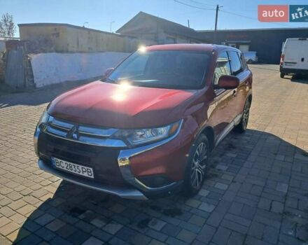 Червоний Міцубісі Аутлендер, об'ємом двигуна 2.4 л та пробігом 125 тис. км за 17999 $, фото 1 на Automoto.ua