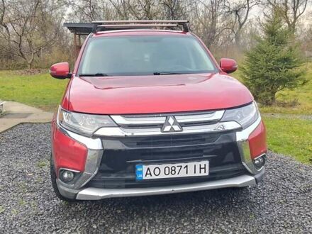 Красный Мицубиси Аутлендер, объемом двигателя 2.36 л и пробегом 110 тыс. км за 16800 $, фото 1 на Automoto.ua