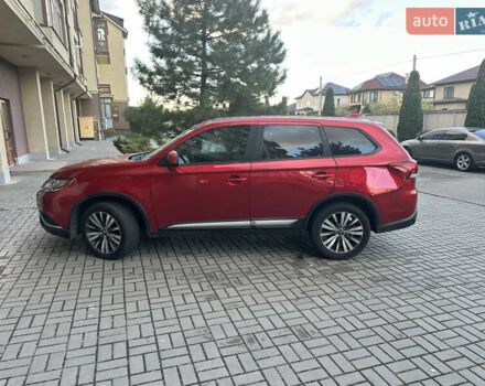 Червоний Міцубісі Аутлендер, об'ємом двигуна 2.36 л та пробігом 95 тис. км за 12500 $, фото 1 на Automoto.ua