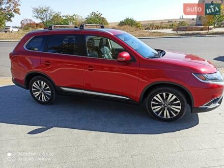 Червоний Міцубісі Аутлендер, об'ємом двигуна 2.4 л та пробігом 70 тис. км за 18500 $, фото 1 на Automoto.ua