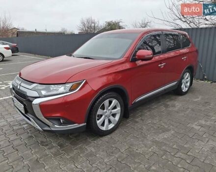 Червоний Міцубісі Аутлендер, об'ємом двигуна 2.36 л та пробігом 110 тис. км за 19000 $, фото 1 на Automoto.ua