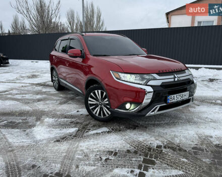 Червоний Міцубісі Аутлендер, об'ємом двигуна 2.36 л та пробігом 96 тис. км за 18600 $, фото 1 на Automoto.ua