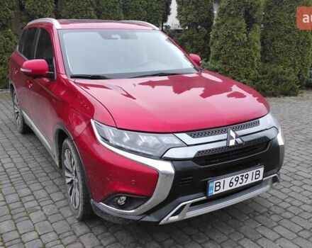 Червоний Міцубісі Аутлендер, об'ємом двигуна 3 л та пробігом 127 тис. км за 28500 $, фото 1 на Automoto.ua