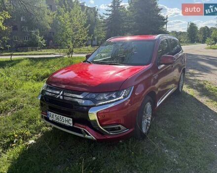 Красный Мицубиси Аутлендер, объемом двигателя 2.36 л и пробегом 78 тыс. км за 21500 $, фото 1 на Automoto.ua