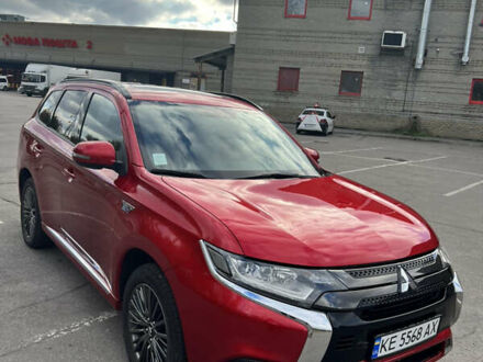 Червоний Міцубісі Аутлендер, об'ємом двигуна 2.36 л та пробігом 94 тис. км за 26000 $, фото 1 на Automoto.ua