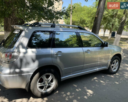 Мицубиси Аутлендер, объемом двигателя 2.4 л и пробегом 285 тыс. км за 5800 $, фото 3 на Automoto.ua