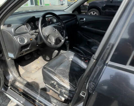 Мицубиси Аутлендер, объемом двигателя 2.4 л и пробегом 300 тыс. км за 3999 $, фото 4 на Automoto.ua