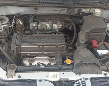 Мицубиси Аутлендер, объемом двигателя 2 л и пробегом 234 тыс. км за 5700 $, фото 3 на Automoto.ua