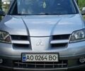 Мицубиси Аутлендер, объемом двигателя 2.4 л и пробегом 265 тыс. км за 5100 $, фото 9 на Automoto.ua