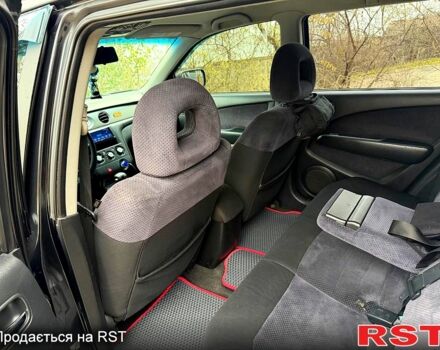 Мицубиси Аутлендер, объемом двигателя 2.4 л и пробегом 407 тыс. км за 5700 $, фото 10 на Automoto.ua