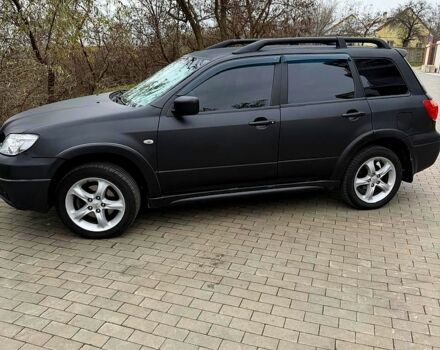 Мицубиси Аутлендер, объемом двигателя 2.4 л и пробегом 407 тыс. км за 5700 $, фото 3 на Automoto.ua