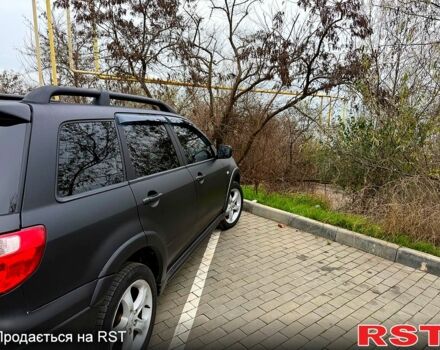 Мицубиси Аутлендер, объемом двигателя 2.4 л и пробегом 407 тыс. км за 5700 $, фото 4 на Automoto.ua