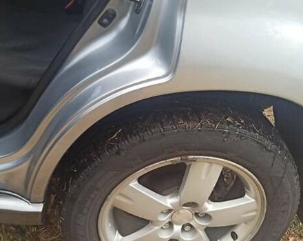 Мицубиси Аутлендер, объемом двигателя 2 л и пробегом 234 тыс. км за 5700 $, фото 8 на Automoto.ua