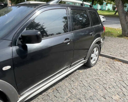 Мицубиси Аутлендер, объемом двигателя 2.4 л и пробегом 300 тыс. км за 3999 $, фото 1 на Automoto.ua
